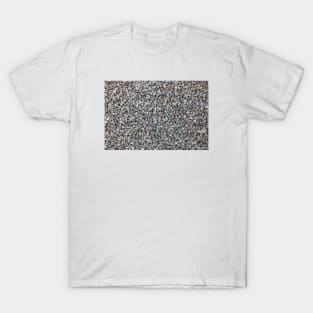 Tiny little stones on a stone beach. T-Shirt